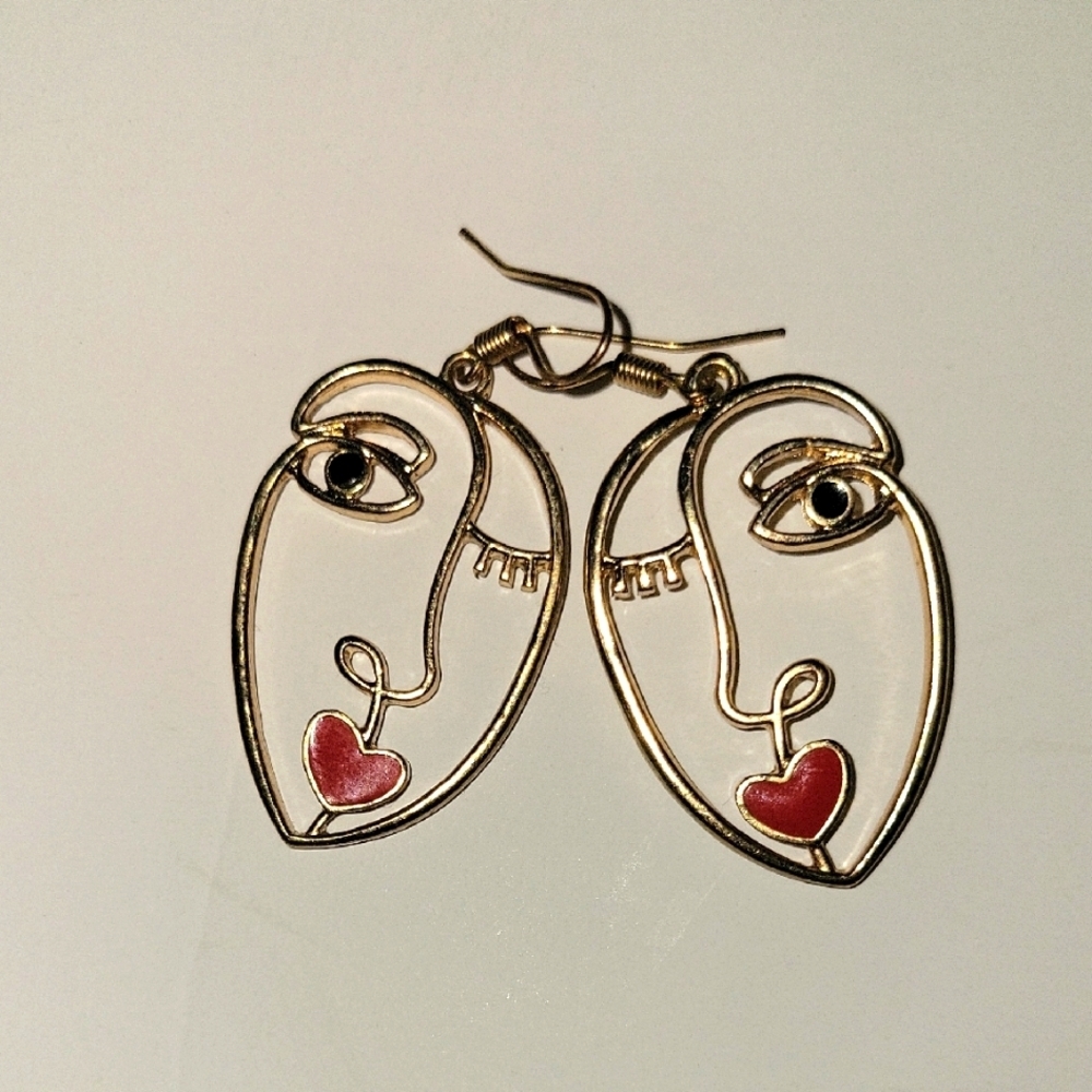 Gold Face‎ Earrings with Red Heart Accent